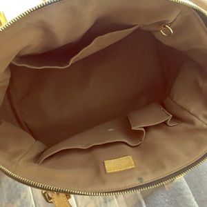 Louis Vuitton medium sized purse. Gently used.